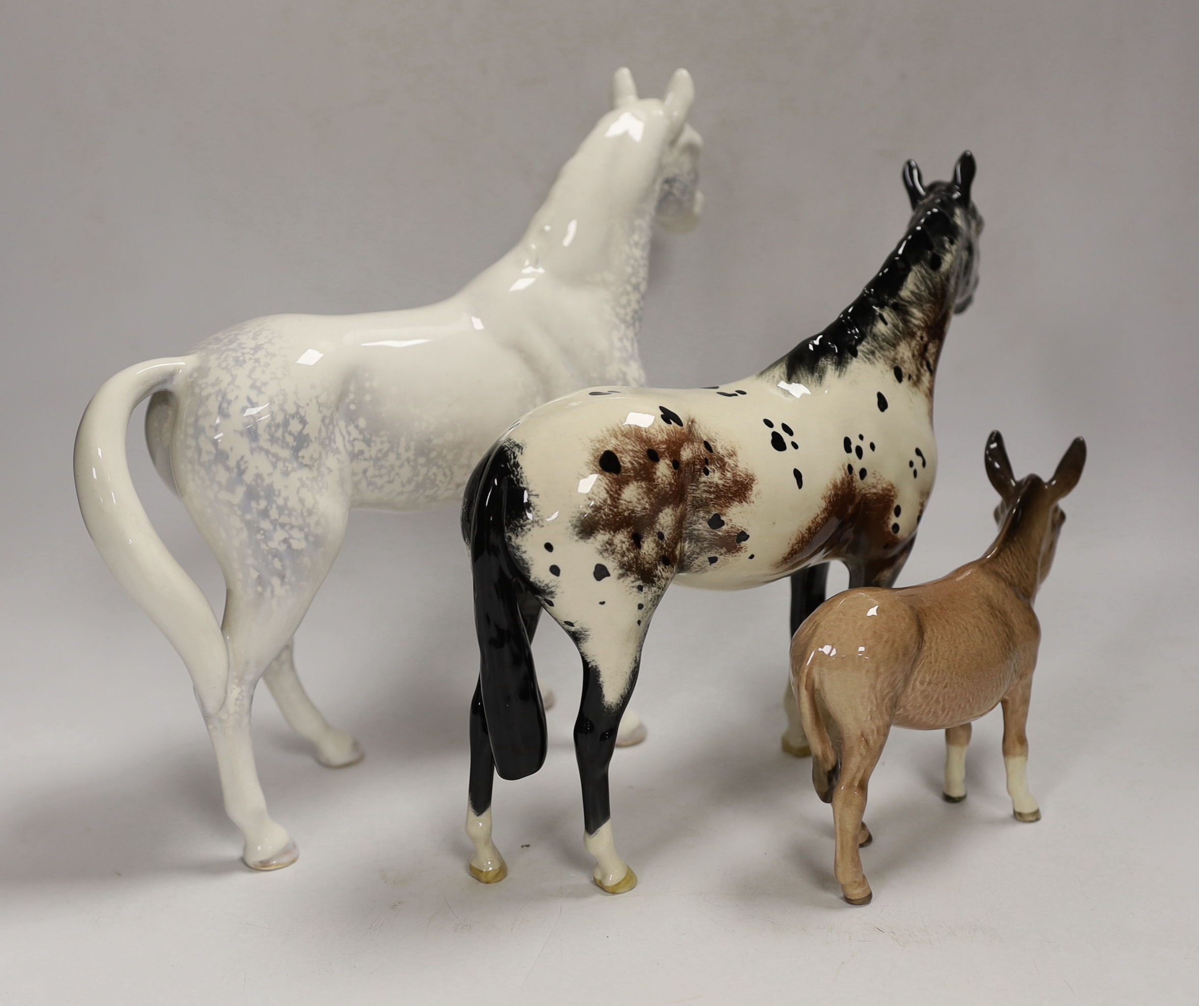 Three ceramic horse models, to include Beswick, Doulton, Sylvac, tallest 23cm